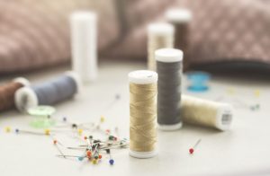 different bobbins and needles