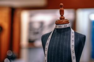  mannequin with measuring tape in a tailor shop