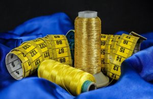 sewing measuring tape with threads